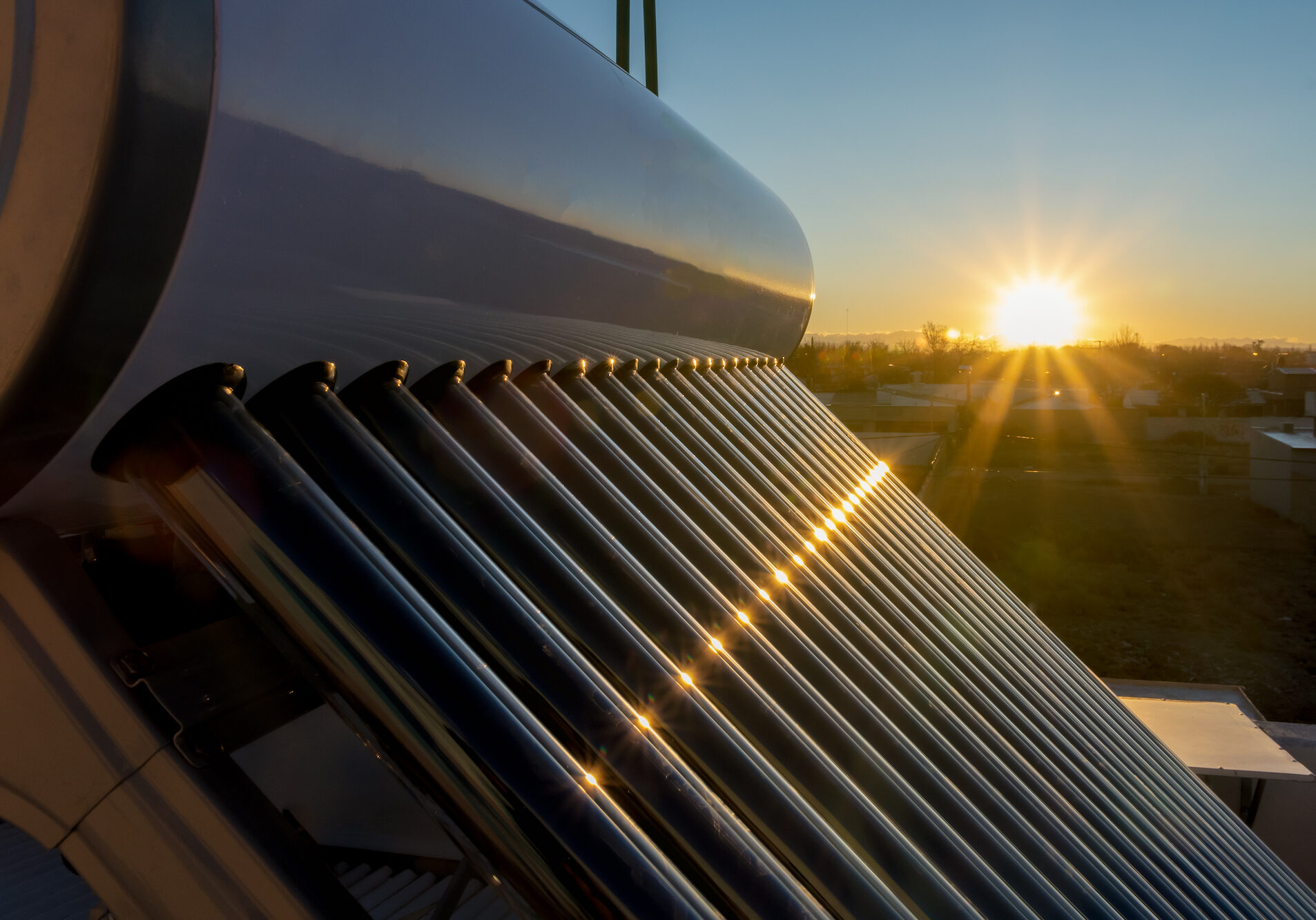 solar hot water tank at sunset