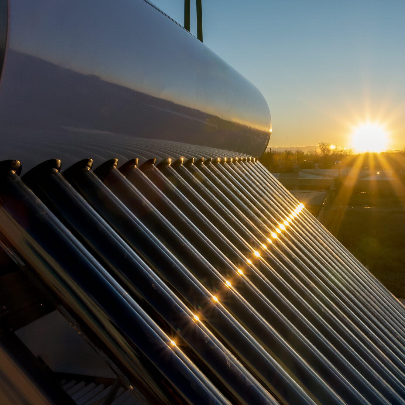 solar hot water tank at sunset